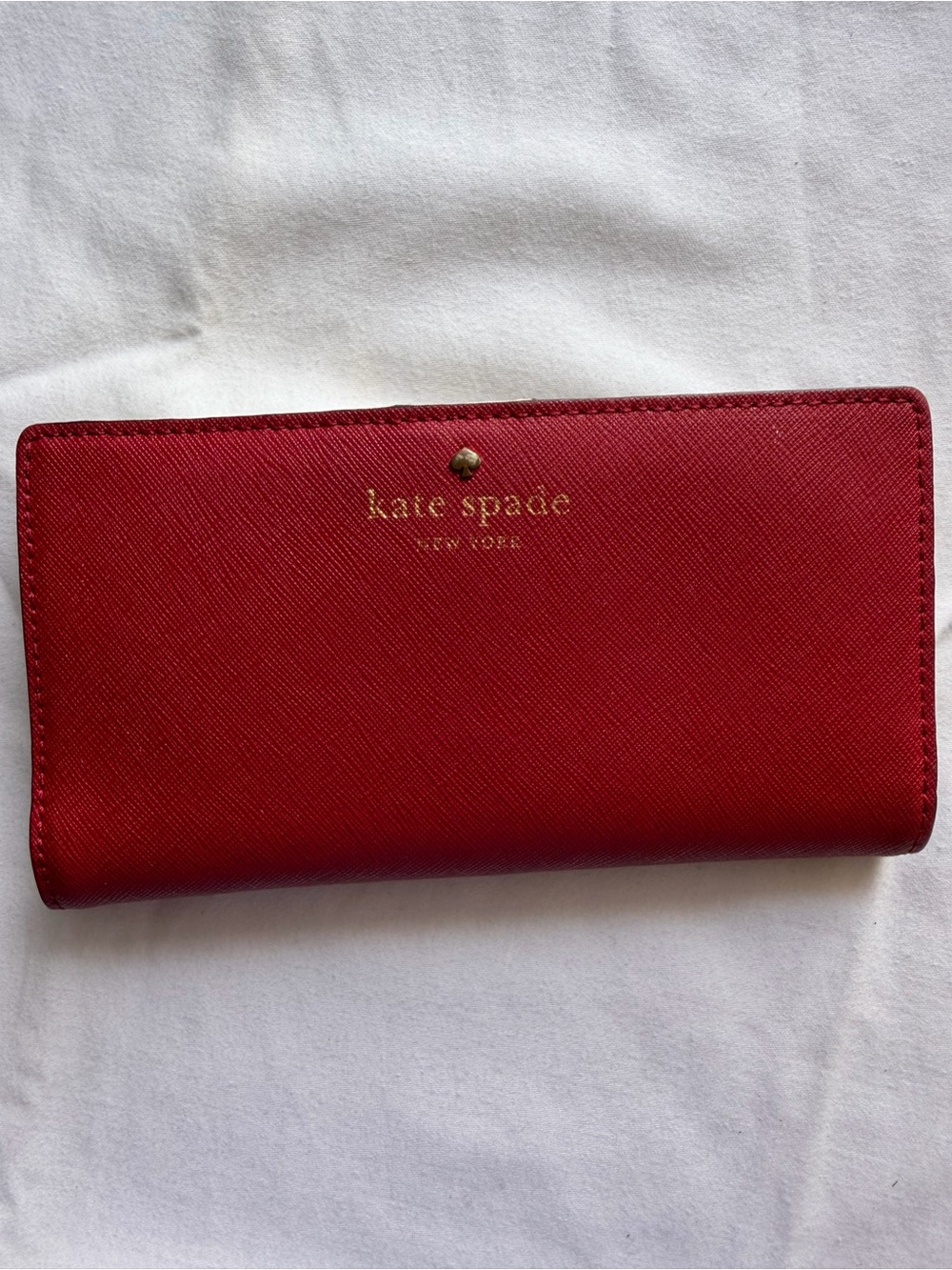 kate spade red continental wallet with gold logo